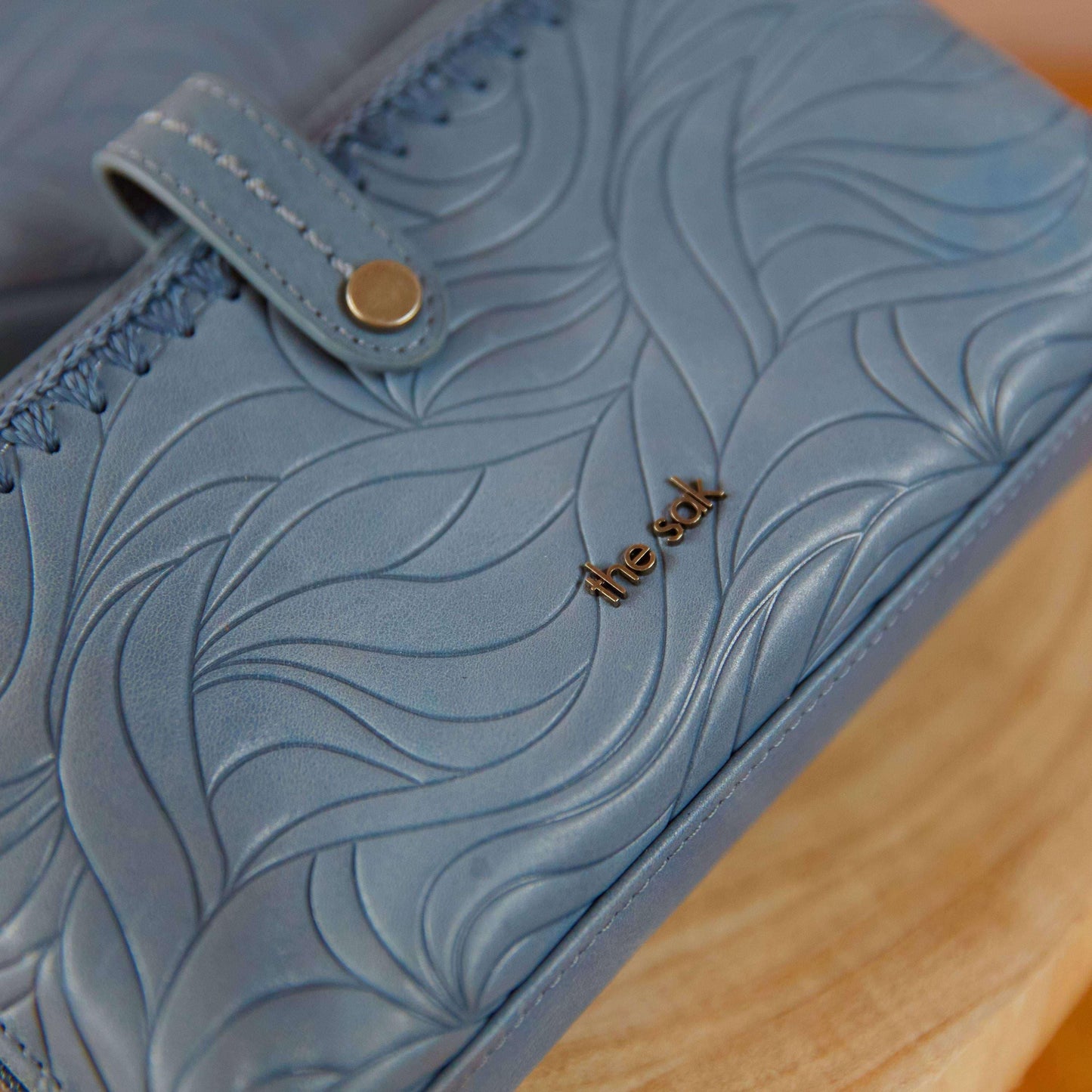 The Sak Iris Large Smartphone Crossbody Leather - |Maritime Wave Embossed|