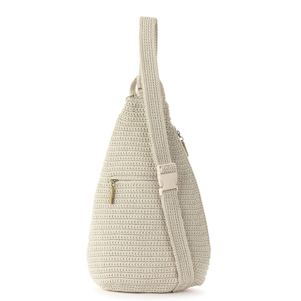 The Sak Geo Sling Backpack - Hand Crochet - Ecru