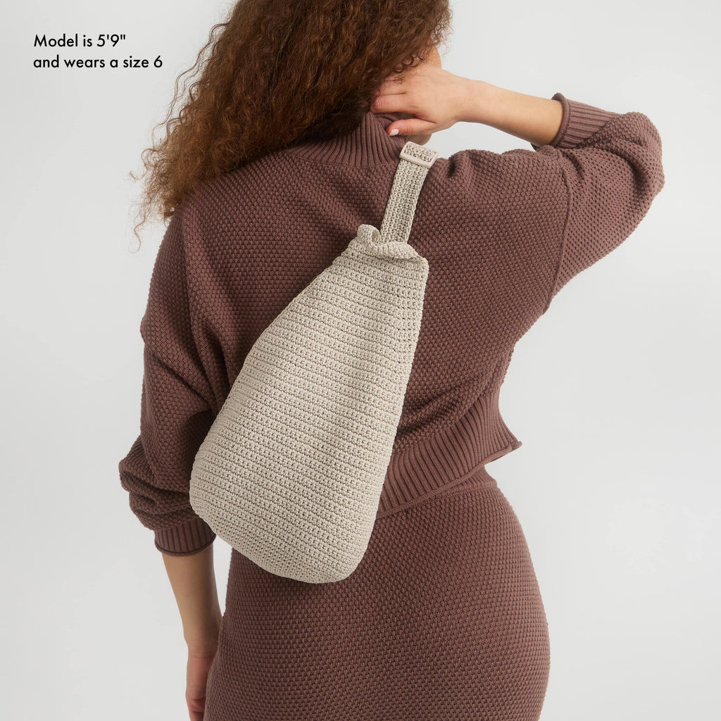 The Sak Geo Sling Backpack - Hand Crochet - Ecru